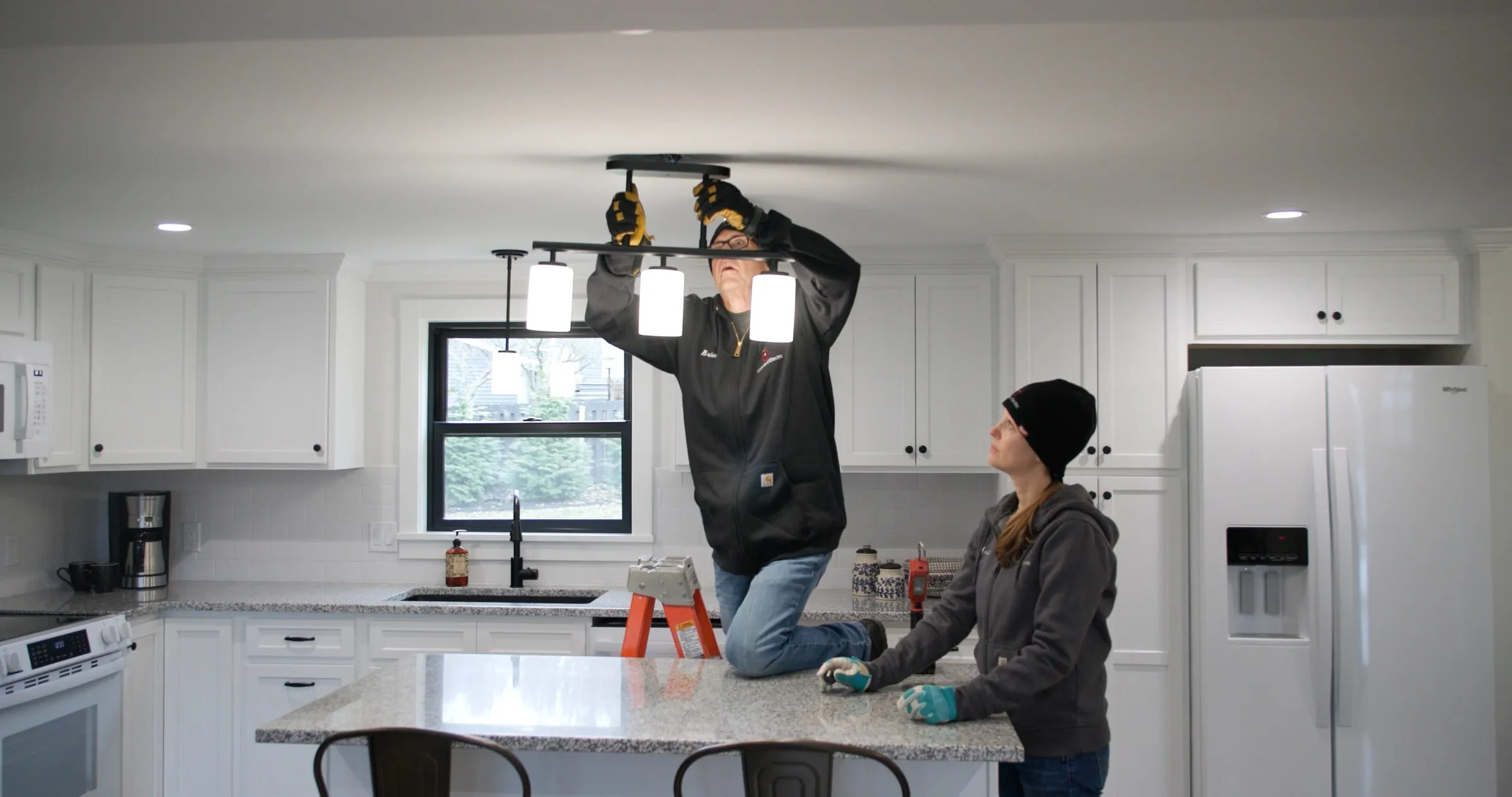 Unlimited Electric technician performing an electrical upgrade